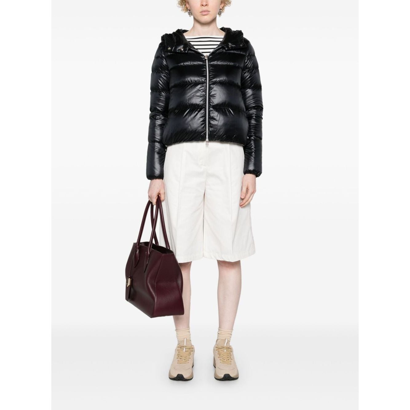 Herno Coats Black feather down padded jacket with hood and zip fastening, styled with long sleeves and drawstring hem.