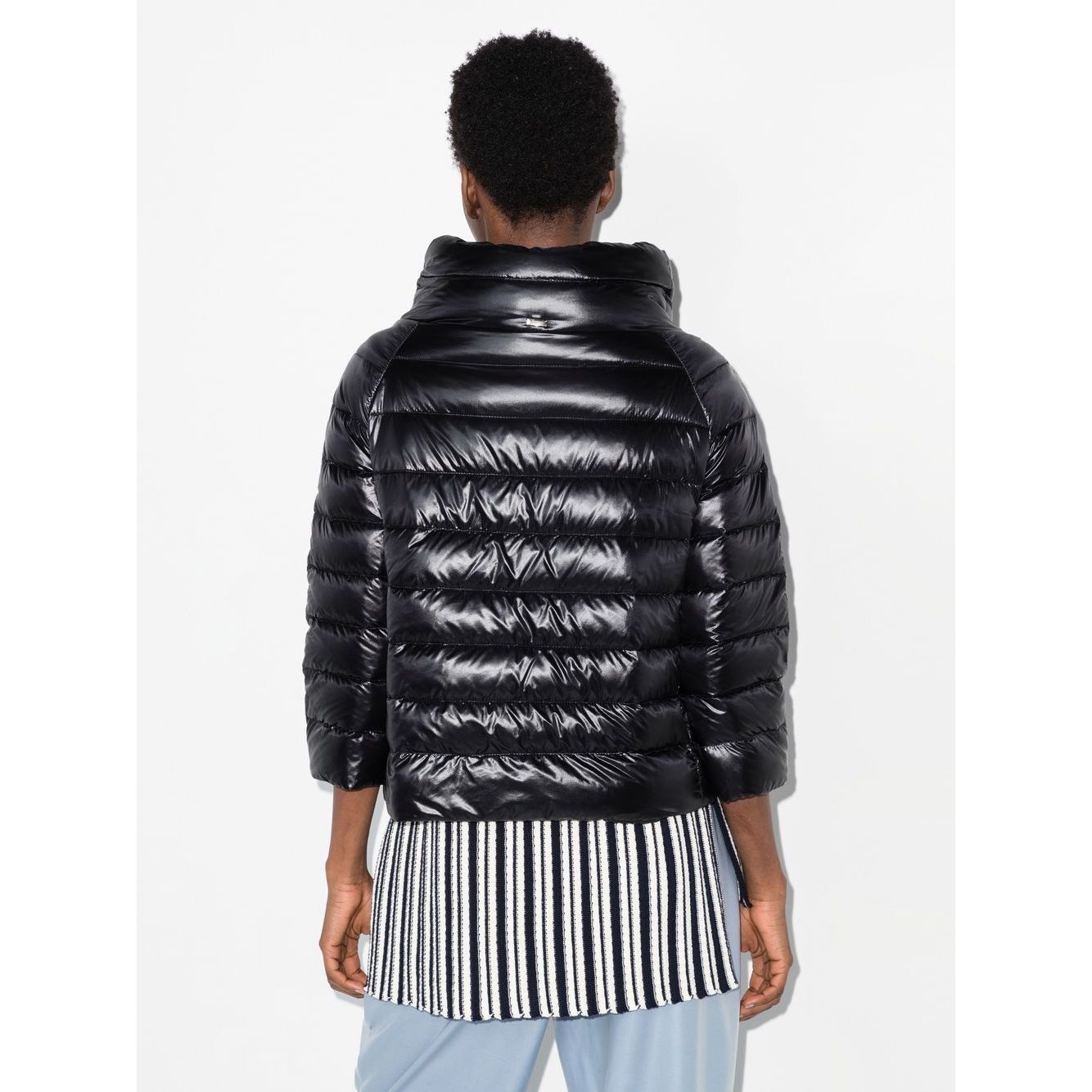 Back view of black Sofia nylon cape from Herno Jackets Black collection, showcasing stylish design and glossy finish.