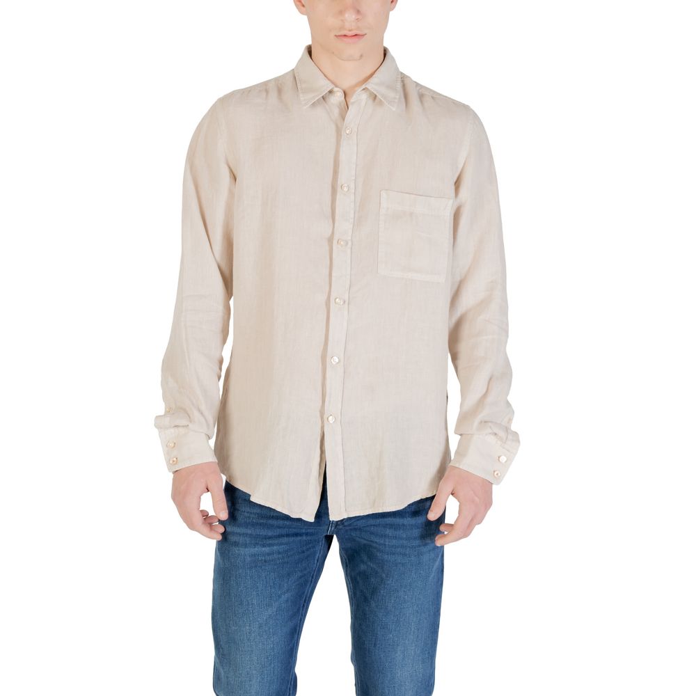 Man wearing Hugo Boss Beige Linen Shirt with long sleeves and chest pocket, styled with jeans.