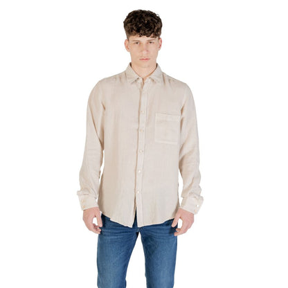 Model wearing Hugo Boss Beige Linen Shirt with long sleeves and chest pocket, perfect for casual and formal occasions.