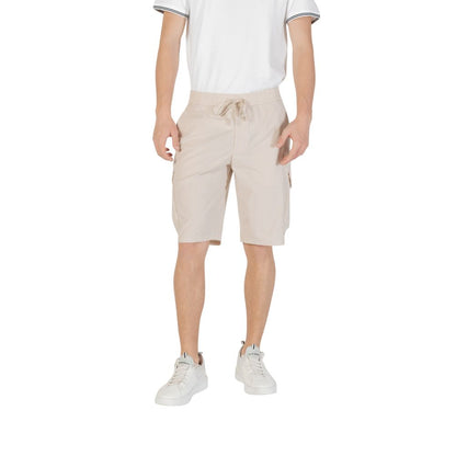 Man wearing Hugo Boss Beige Polyester Bermuda Shorts with elastic waistband and side pockets.