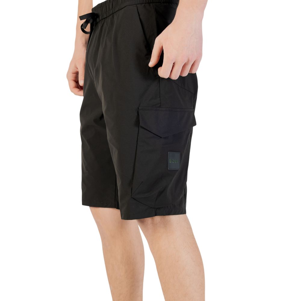 Side view of Hugo Boss Black Polyester Bermuda Shorts featuring side pockets and drawstring waist for a casual and functional look.
