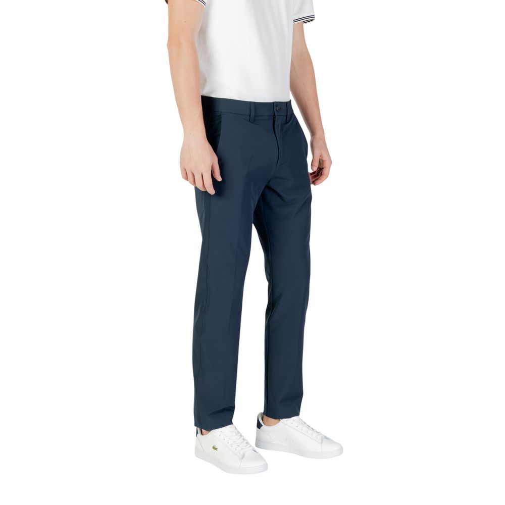 Hugo Boss Blue Polyester Skinny Pants showcasing a slim fit for style and comfort, perfect for casual occasions and everyday wear.