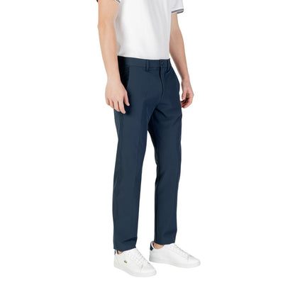 Hugo Boss Blue Polyester Skinny Pants showcasing a slim fit for style and comfort, perfect for casual occasions and everyday wear.