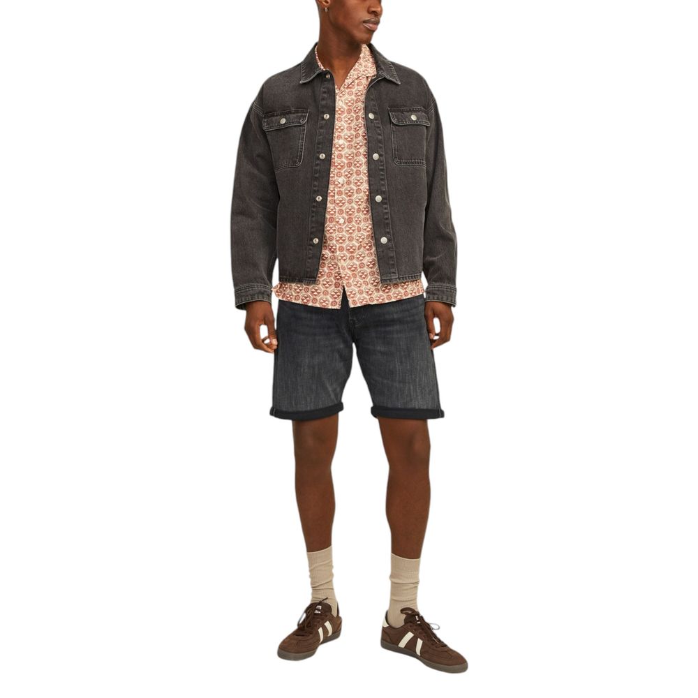 Model wearing Jack Jones Black Cotton Bermuda Shorts with stylish jacket and shirt ensemble.
