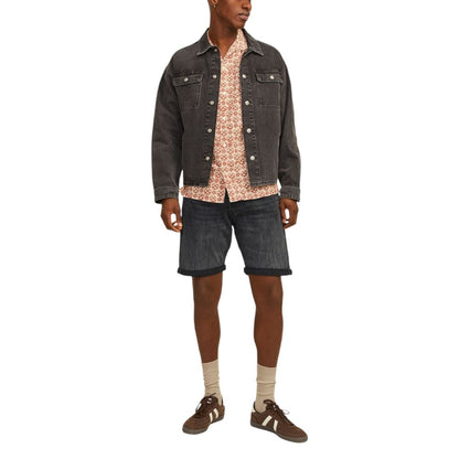 Model wearing Jack Jones Black Cotton Bermuda Shorts with stylish jacket and shirt ensemble.