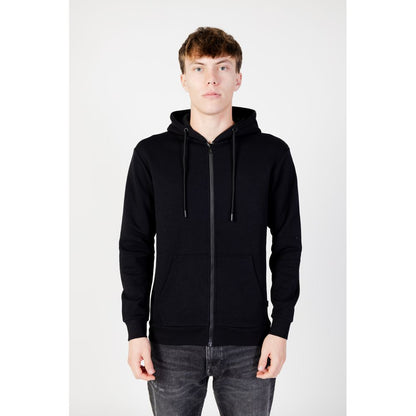 Young man wearing Jack Jones Black Polyester Hoodie with full zip and drawstring hood, showcasing trendy design and comfort.