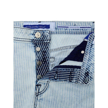 Jacob Cohen Blue Cotton Skinny Jeans with stripe detail, button fly, and contrasting blue stitching. Includes tag and exclusive fragrance.