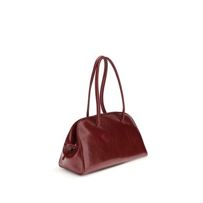 Jacquemus Red Calf Leather Bos Taurus Shoulder Bag with double-zip closure and elegant knotted handles, shown in a side view.