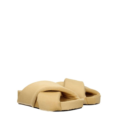 Jil Sander Beige Horsehair Slippers with vintage effect, open toe, low flat heel, leather sole, crafted from beige pony skin.