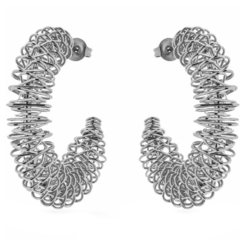 Coiled silver earrings, featuring a spiral design for a stylish look.