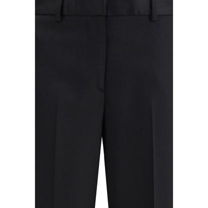 Lardini Black Wool Dress Pants with zipper closure, belt loops, and welt pockets for a classic elegant look, made of 100% wool.