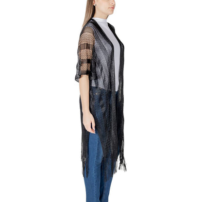 Side view of model wearing Liu Jo Black Polyester Scarf with lurex net design and fringes, perfect for casual or special occasions.
