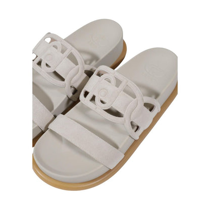 Liu Jo Gray Leather Flat Sandals with decorative double straps, minimal design, and flat sole, made of high-quality bovine leather.