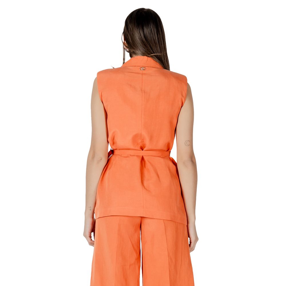 Back view of Liu Jo Orange Lyocell Waistcoat on model, showcasing double-breasted design and waist belt for elegant silhouette.