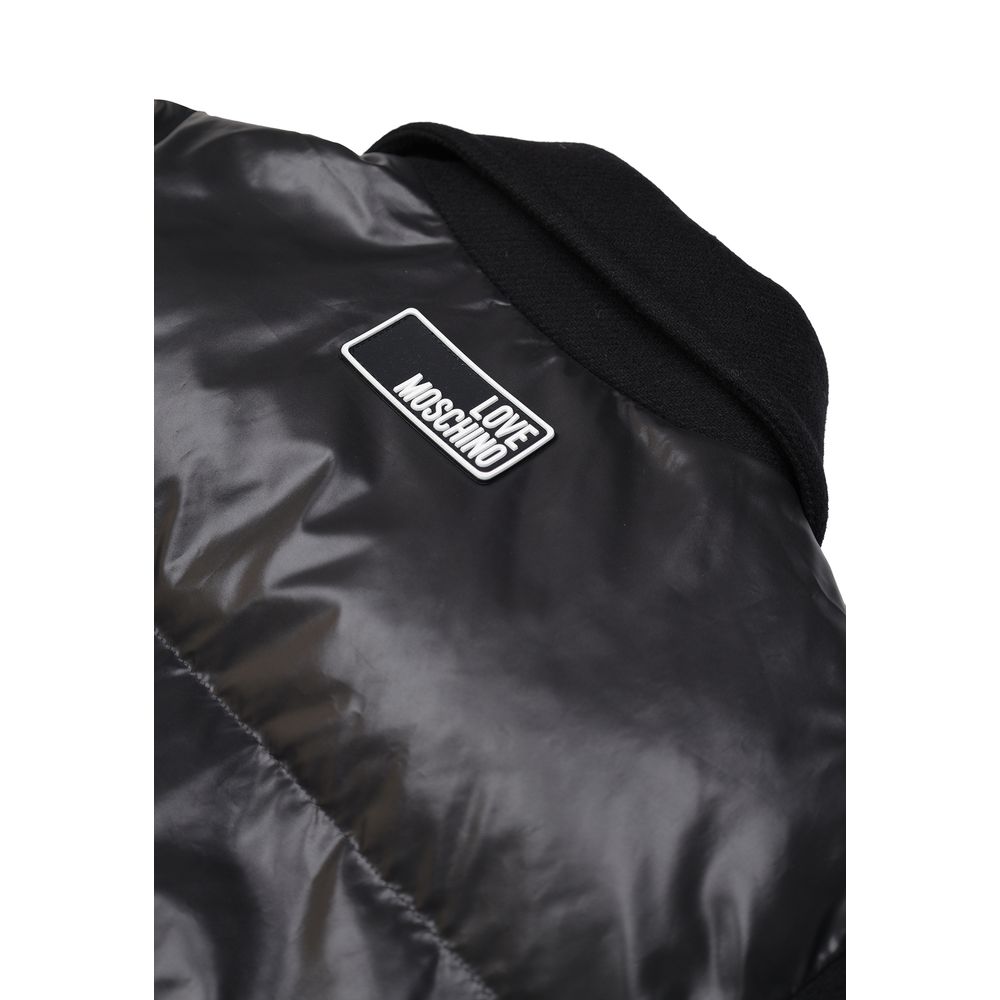 Love Moschino Black Polyester Clothing featuring elegant padded puffer design, collar detail, and brand logo on jacket back.