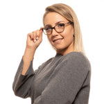 Woman wearing Lozza Brown Women Glasses Frame, full-rim, oval style, spring hinge, plastic material for stylish eyewear.