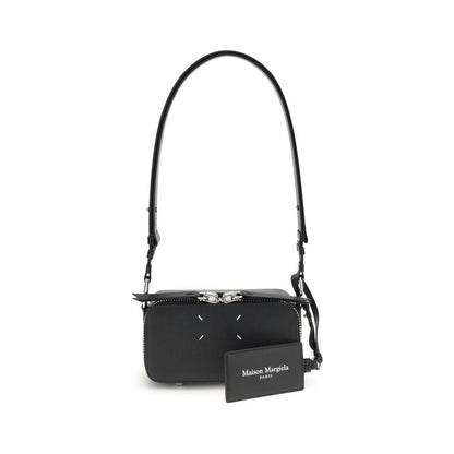 Margiela Black Calf Leather Bos Taurus Shoulder Bag with adjustable strap and zippered closure, featuring four-stitch logo.
