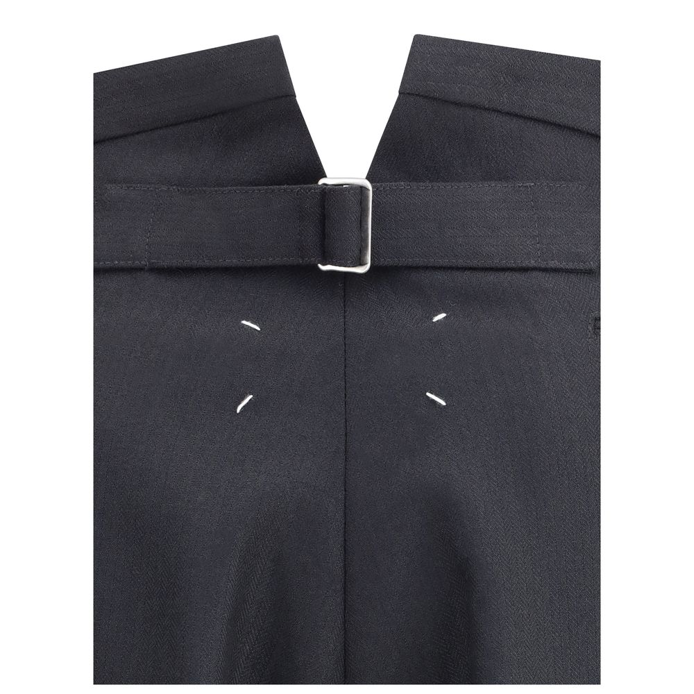 Close-up of Margiela Black Wool Dress Pants showcasing iconic stitching and buckle detail.