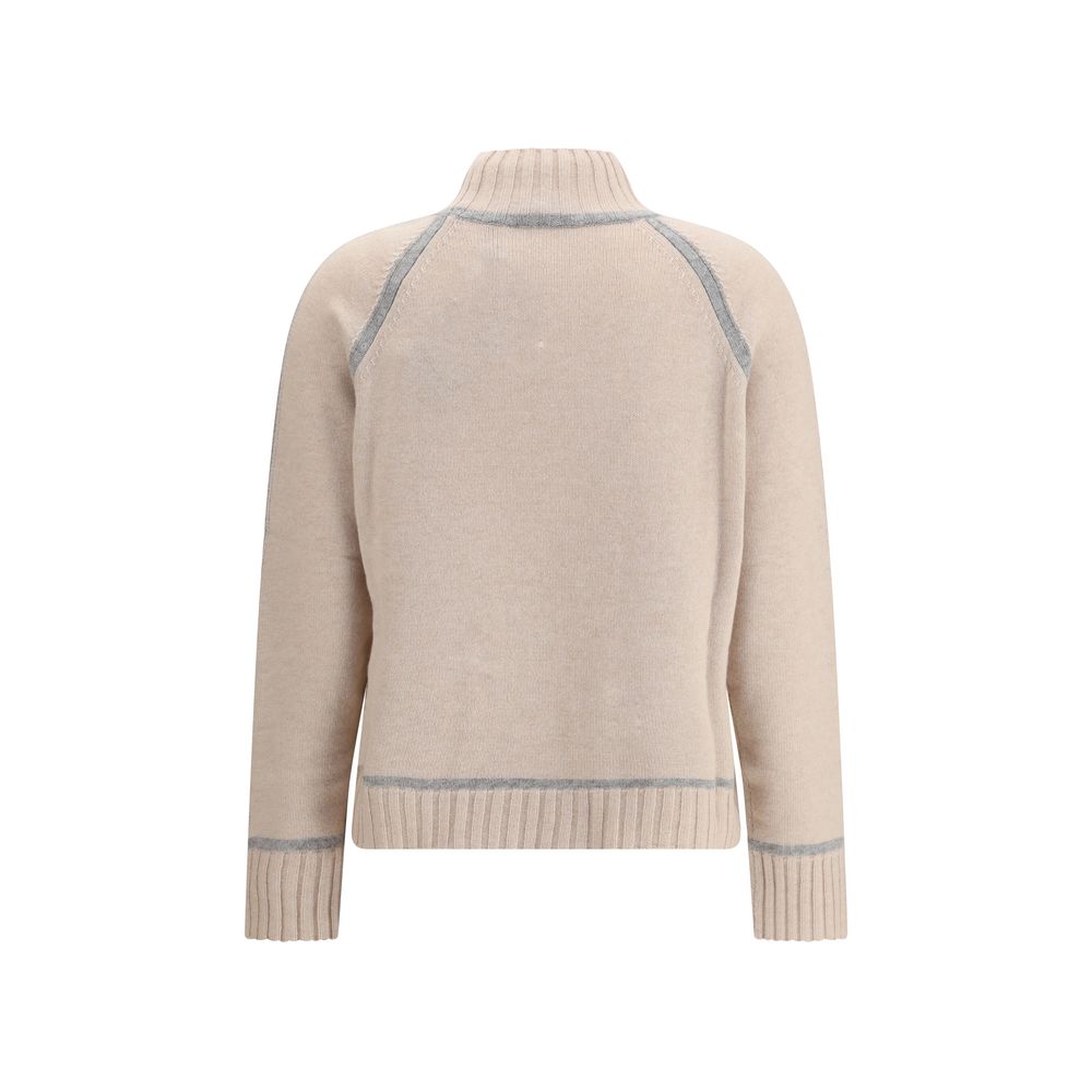 Max Mara Beige Wool Turtleneck with high neck and raglan sleeves, featuring ribbed edges, crafted for warmth and softness.