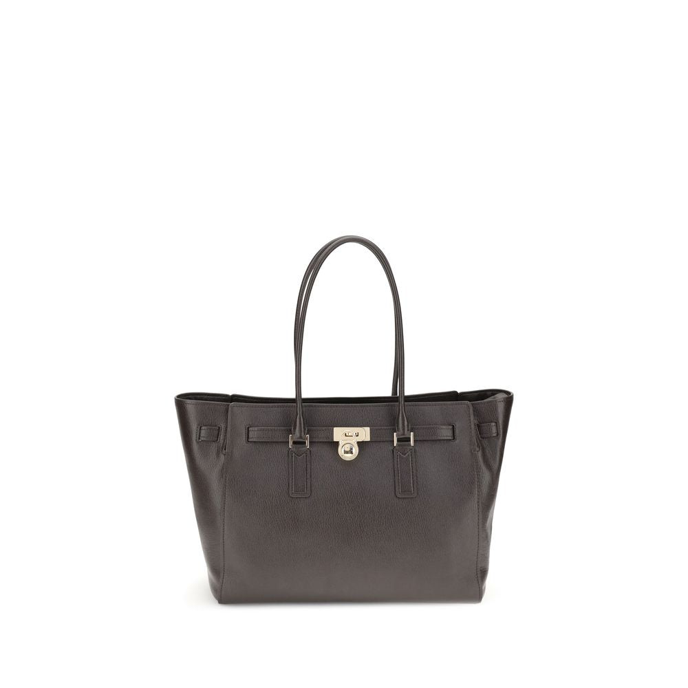 Michael Kors Brown Calf Leather Bos Taurus Shoulder Bag with iconic padlock pendant and decorative belt.