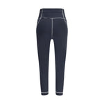 Back view of Moncler Grenoble Leggings in technical fabric with logo patches, designed for active lifestyle, slim fit, SS25 collection.