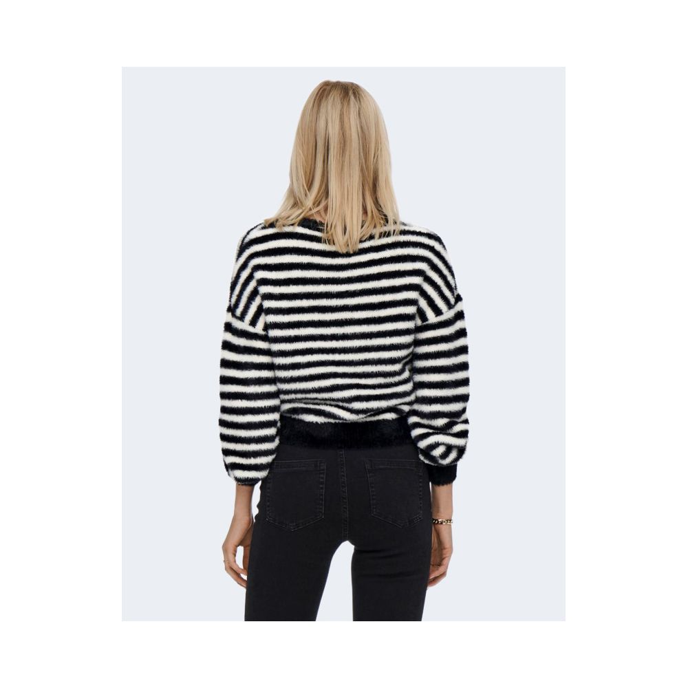 Woman wearing Only Black And White Marabou Sweatshirt, striped design, back view showing long sleeves, suitable for casual occasions.