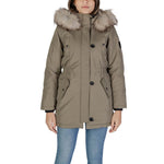 Woman wearing Only Green Polyester Parka with faux fur hood, ideal for winter.