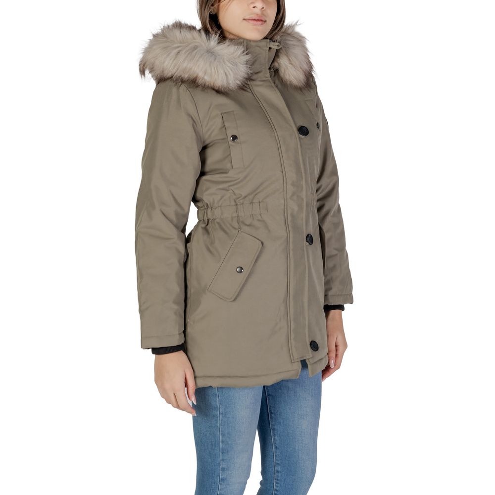 Woman wearing Only Green Polyester Parka with fur-lined hood, showcasing its elegant design and cold-weather durability.