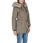 Woman wearing Only Green Polyester Parka with fur-lined hood, showcasing its elegant design and cold-weather durability.