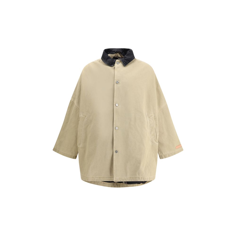 PDF Channel Oversized cotton Jacket with front button closure, denim collar, and asymmetrical hem, featuring a contemporary design.