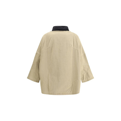 Back view of PDF Channel Oversized cotton Jacket with contrasting denim collar and asymmetrical hem, featuring side welt pockets.