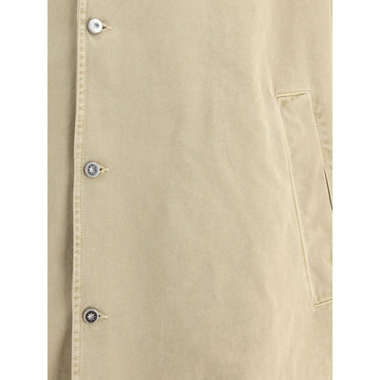 PDF Channel Oversized cotton Jacket detail showing front button closure and side welt pocket in beige fabric.