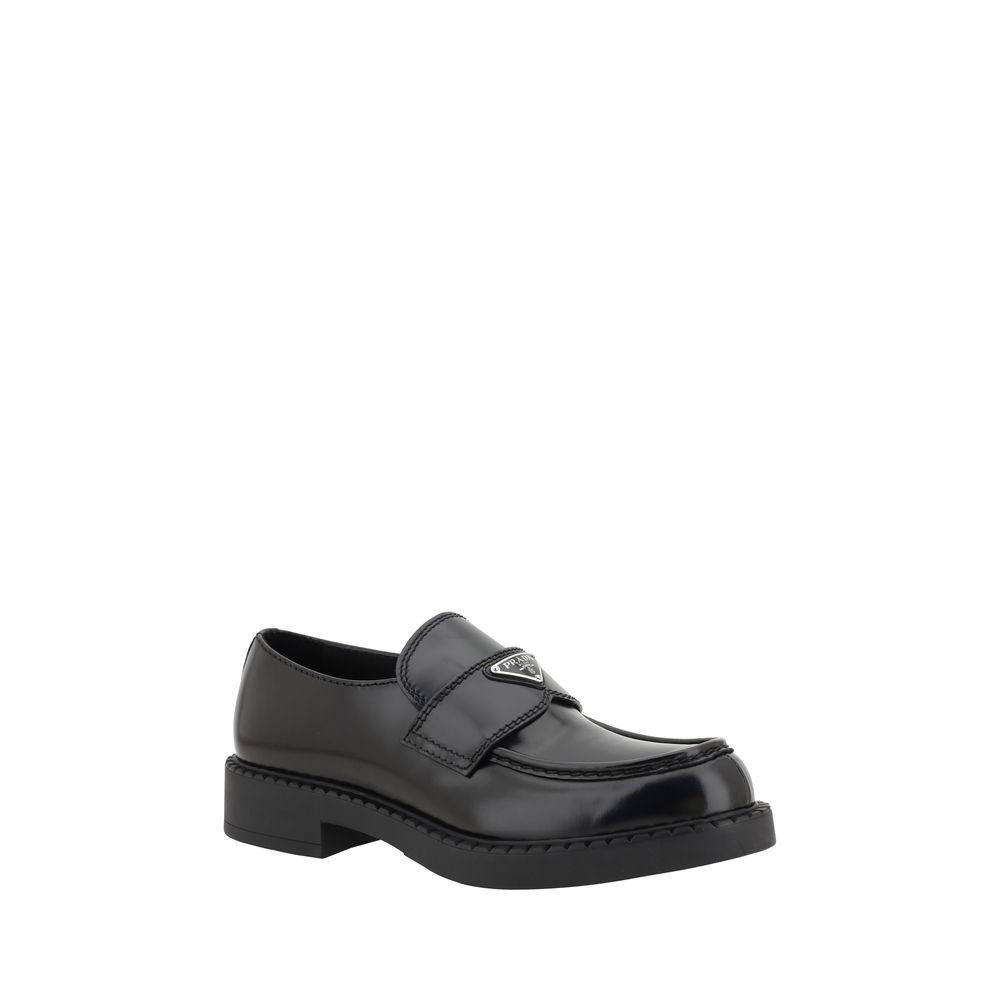 Prada Black Rubber Platform Loafers with logo plaque and textured sole