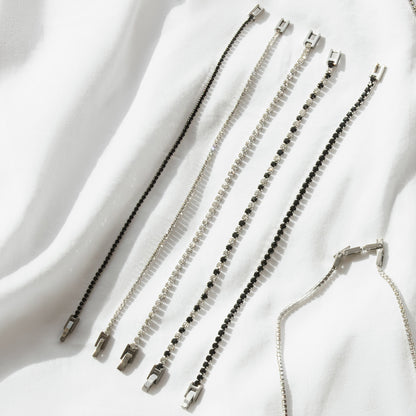 Assorted bracelets showcasing RADIANT JEWELS JEWELRY Mod. RH000011 on a white background, highlighting elegance and style.