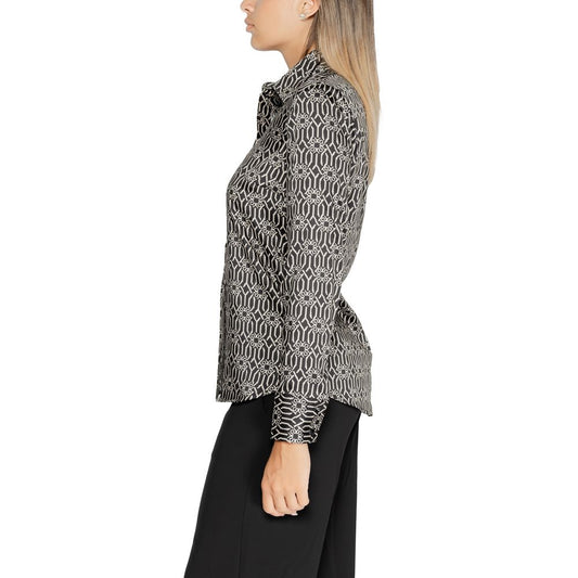Side view of model wearing Rinascimento Black Polyester Shirt, fall/winter women's fashion, 100% polyester composition.