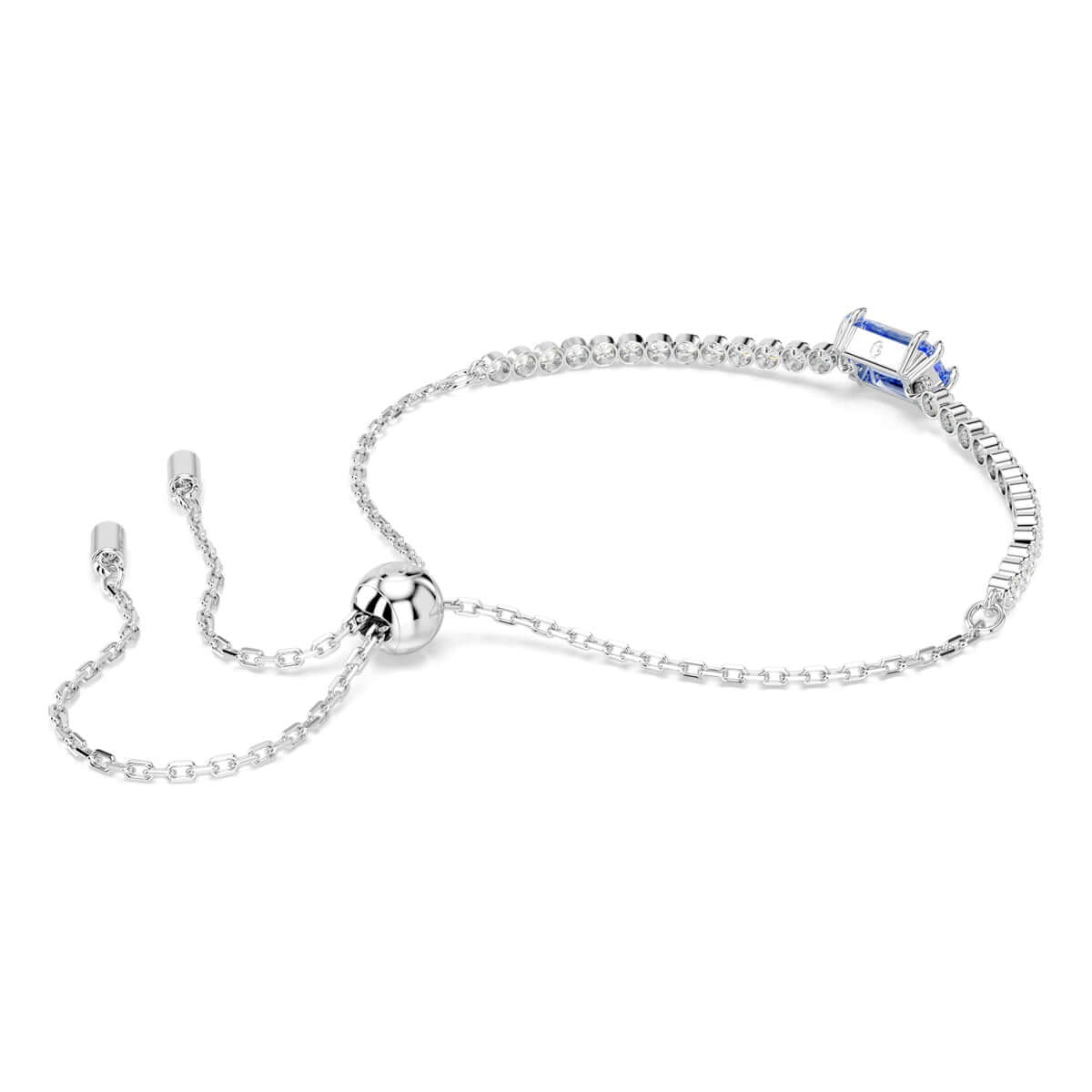 Swarovski silver bracelet with blue crystal detail, adjustable chain, featuring elegant design and high-quality craftsmanship.