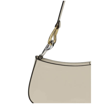 Close-up of Staud Cream Calf Leather Bos Taurus Shoulder Bag with double snap hook detail on strap