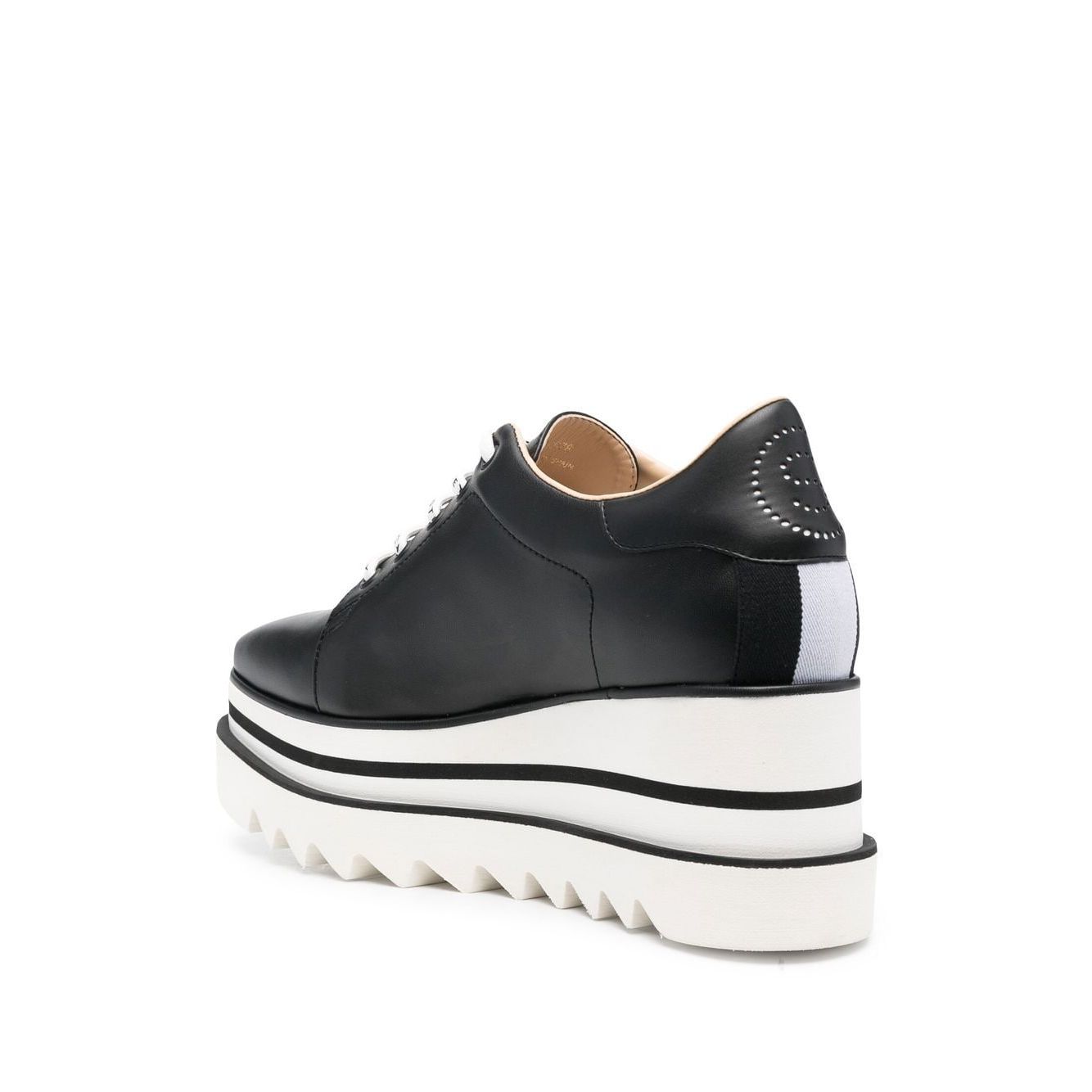 Stella McCartney Sneakers Black with high wedge heel and rubber sole, side view of Elyse Eco Alter low-top sneakers.
