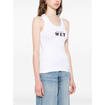 Stella McCartney Top White racerback scoop neck tank top with 'Slippery When Wet' print, worn by model, size S.