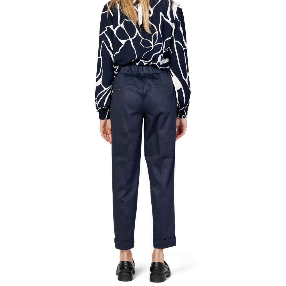 Back view of woman wearing Street One Blue Viscose Pant, showcasing tapered fit and double button fastening.