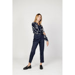 Model wearing Street One Blue Viscose Pant, stylish high-waist trousers, featuring a modern fit and double button fastening for a chic look.