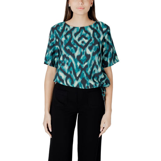 Model wearing Street One Green Viscose Blouse with round neck and short sleeves, featuring elegant gathered details for a stylish look.