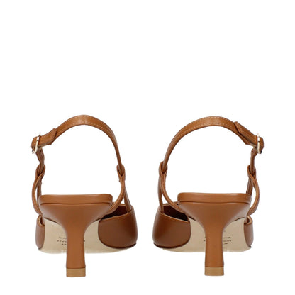 Back view of Stuart Weitzman Brown Leather Mid Heel Pumps with buckle strap and mid heel design.