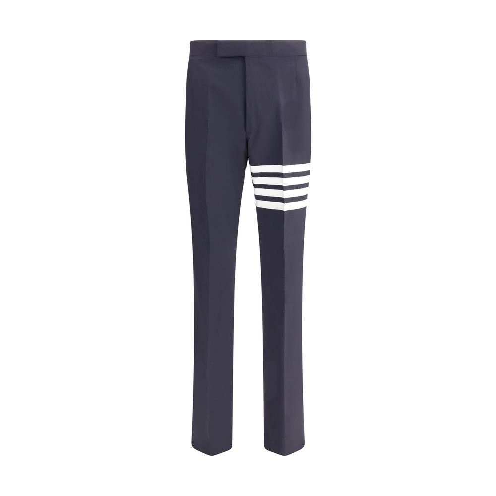 Thom Browne Blue Wool Dress Pants with iconic bands and embossed buttons for formal elegance.
