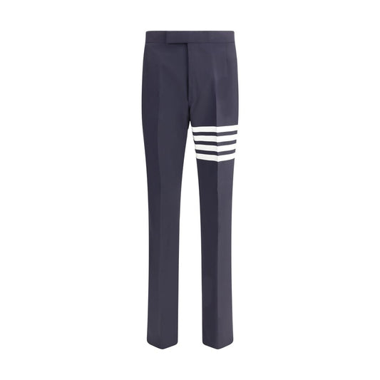 Thom Browne Blue Wool Dress Pants with iconic bands and embossed buttons for formal elegance.