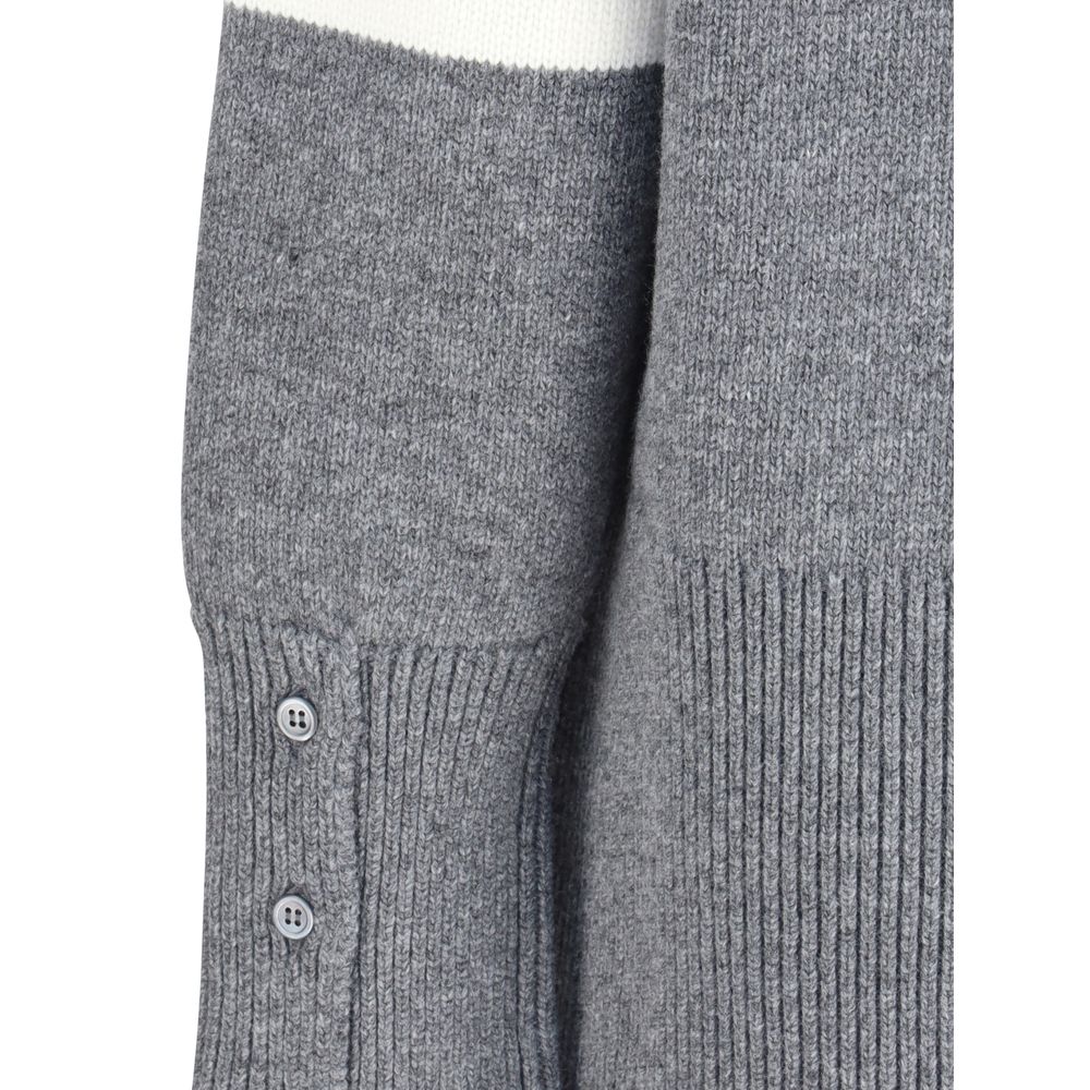 Close-up of Thom Browne Gray Fleece Wool Sweatshirt showing ribbed cuffs and side buttons.