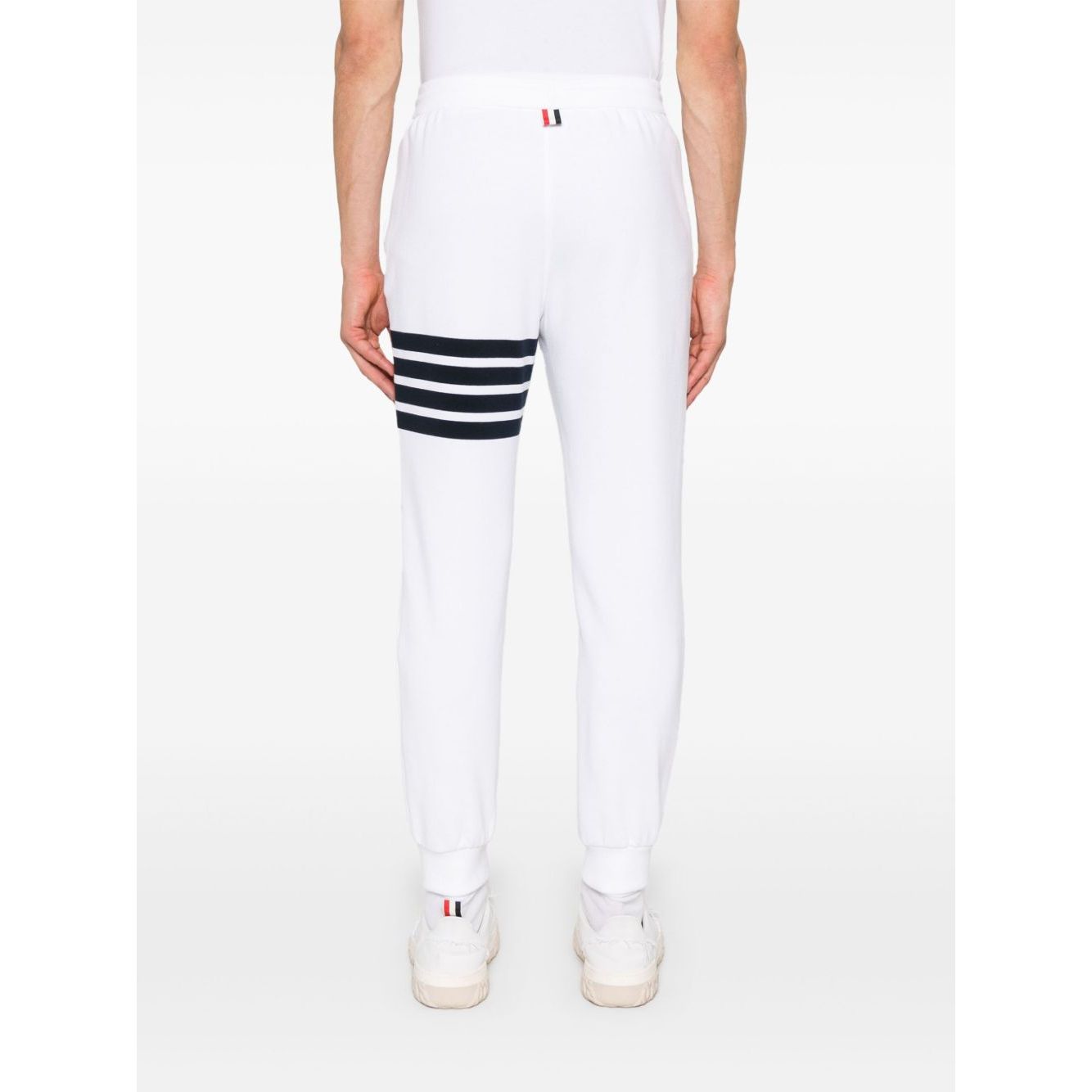 Back view of Thom Browne Trousers White elasticated waistband, grosgrain loop tab, 4Bar cotton design.
