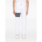 Back view of Thom Browne Trousers White elasticated waistband, grosgrain loop tab, 4Bar cotton design.