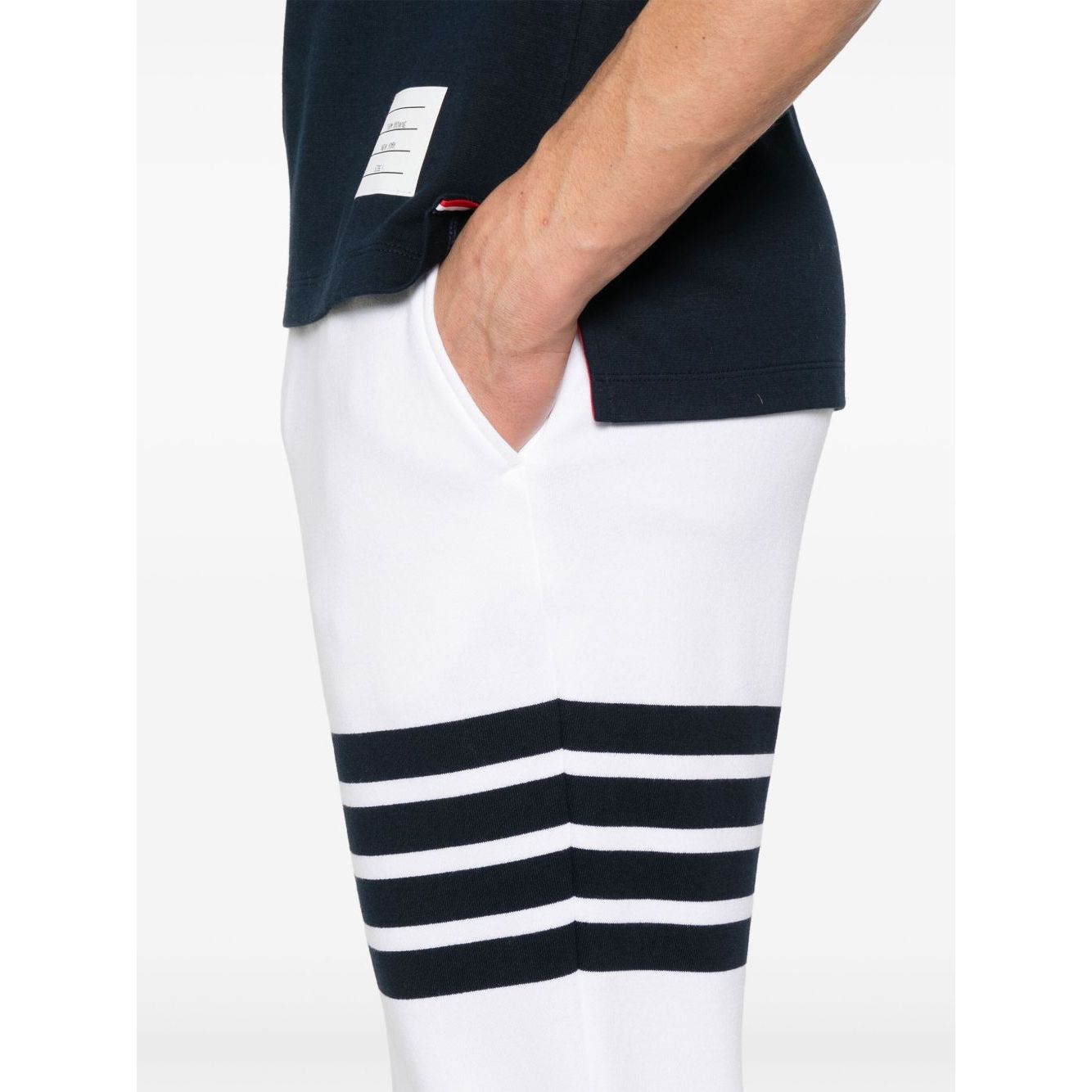 Thom Browne Trousers White with elasticated drawstring waistband and side slit pockets featuring signature grosgrain loop tab